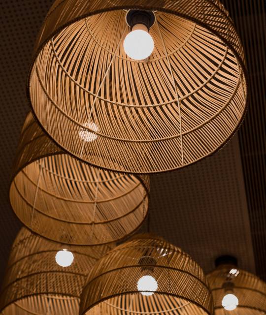 brown round lantern turned on in dim light